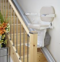 stair lift on tan stairs