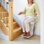 older woman on stair lift
